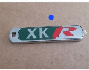 NEW DAMAGED GENUINE JAGUAR XKR R-PERFORMANCE REAR BADGE WITH KEYHOLE - Picture 1 of 7