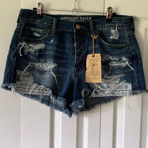 Pantalones cortos de mezclilla para mujer American Eagle de tiro alto desgastados talla 10 azules - Imagen 1 de 11
