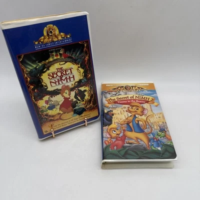 The Secret of Nimh 1 & 2 Timmy to the Rescue -- Clamshell VHS Tapes Vintage - Image 1 of 4