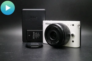 🎦VIDEO👀 [MINT] White Nikon 1 J1 10MP Mirrorless NIKKOR 18.5mm f1.8 From JAPAN - Picture 1 of 12