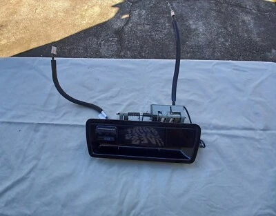 2004-2013 NISSAN ARMADA LIFTGATE HANDLE WITH CAMERA BLACK USED GOOD - Image 1 of 4