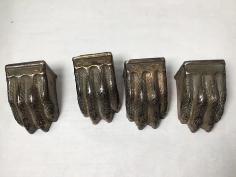 Vintage metal caps as lion paws for furniture Cover