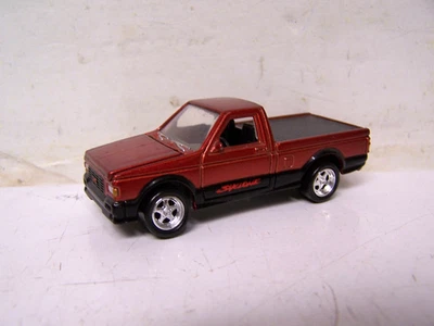 Johnny Lightning Truckin' America 1991 GMC Syclone 1:64 Diecast Pickup Truck - Image 1 of 4