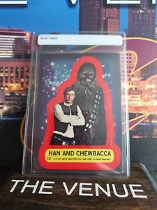 1977 Topps Star Wars - Sticker #12 Han Solo & Chewbacca - A - Picture 1 of 2