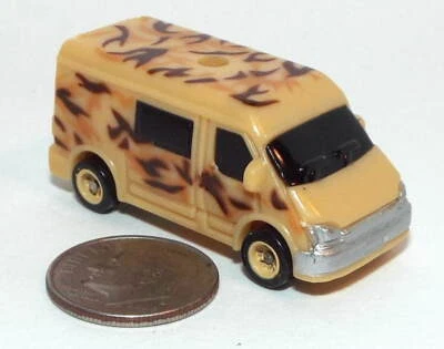 Mini furgoneta radar Hot Wheels muy pequeña en camuflaje del desierto Foto 1 de 4