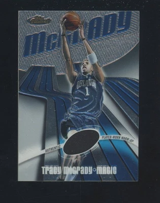 2003-04 Topps Finest #111 Tracy McGrady Magic HOF Patch 575/999 - Image 1 of 2