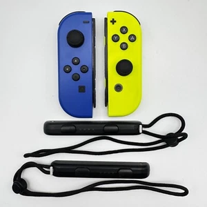 Original Nintendo Switch Joy-Con Neon Gelb/Neon-Blau inkl. Handschlaufen - Bild 1 von 14