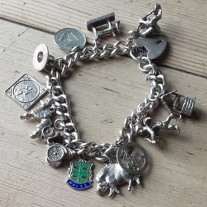 PULSERA CON DIJE DE PLATA con Cierre de Candado y 13 DIJES DE PLATA 55g - Imagen 1 de 19