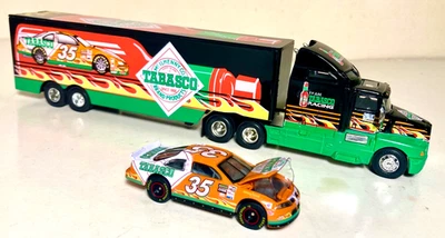 Camión de transporte y coche de carreras Racing Champions escala 1/64 Todd Bodine Tabasco Team Foto 1 de 4