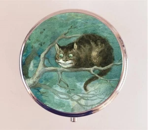 Estuche Pastillero Gato Cheshire Pastillero Soporte Baratija Alicia en el País de las Maravillas Libro - Imagen 1 de 3