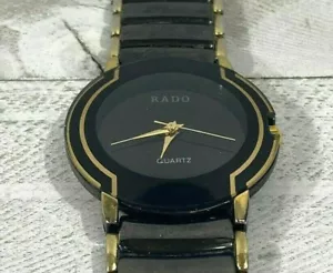 Reloj analógico vintage Rado 87828 esfera negra y correa dorada negra - Imagen 1 de 1
