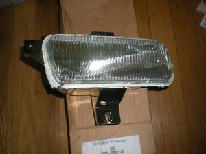 NOS 1986-1991 Ford Taurus Cornering Lamp Asy RH E6DZ-15A201-A - Picture 1 of 3