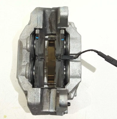 Pinza de freno delantera Silverado Tahoe Sierra Yukon 2019-2026 nueva despegue OEM pastillas Foto 1 de 4