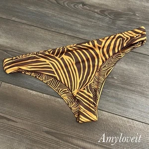 Parte inferior de bikini reversible Free People talla mediana nueva - Imagen 1 de 5