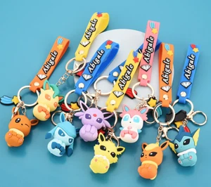 Pokemon Eevee Evoluzione Kawaii Silicone 3D Braccialetto Kawaii Cartone Animato Portachiavi  - Foto 1 di 12
