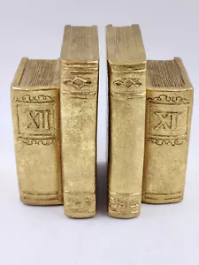 Coppia fermalibri vintage resina tono oro finti libri numeri romani XII CBK Ltd 1995 - Foto 1 di 8