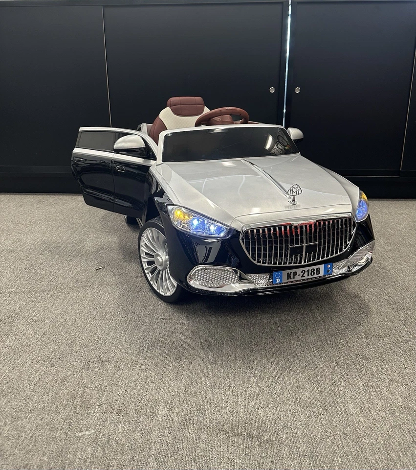 Nuevo coche de paseo con rueda eléctrica de 12 V para niños con control remoto Foto 1 de 4