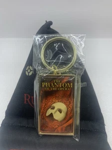 Phantom der Oper Schlüsselanhänger 1986 Vintage Theater Souvenir goldfarben NEU NEU IN VERPACKUNG ST - Bild 1 von 4