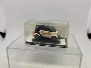 Busch 1:87 Smart City Coupe Johanniter - Picture 1 of 3