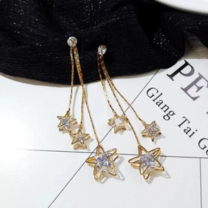 Modeschmuck fünf - spitze Sterne lange Quaste Zirkon Ohrhänger. - Bild 1 von 3