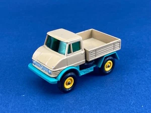 1:66 MATCHBOX Lesney 49b MERCEDES-BENZ UNIMOG 406 Braun/Türkis Gelbe Felgen TOP! - Bild 1 von 9