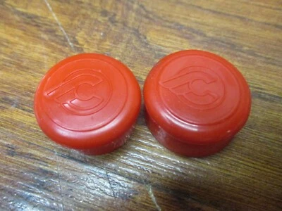 NOS ORIGINAL CINELLI LOGO  ROAD RIKE HANDLEBAR WRAP TAPE END CAP SET - RED (2) - Image 1 of 2