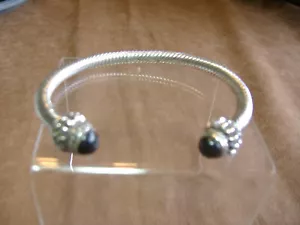 VINTAGE STERLING SILVER AND ONYX SPIRAL DESIGN BRACELET - Picture 1 of 4