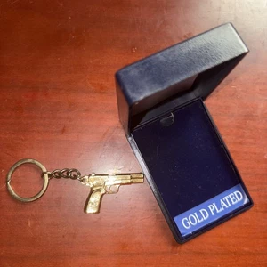 FN Herstal S.A. Portachiavi pistola arma placcato oro - Foto 1 di 10