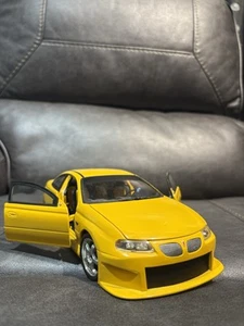 Ertl Racing Champions Limited Edition 2004 Yellow Pontiac GTO Die Cast Car - Picture 1 of 10