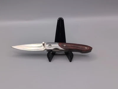 Navaja de bolsillo de acero inoxidable sin marca. Hoja de 2 5/8" Foto 1 de 4