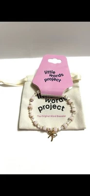 Little Words Project 粉色和白色 带金色蝴蝶结手链 含包 全新带标签 — 第 1/4 张图片