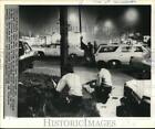1974 Press Photo Policemen during a shootout with kidnappers in Cleveland, Ohio