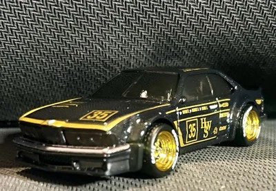Rueda y neumático Hot Wheels de carrocería ancha BMW 635 CSI CUSTOM pilotos reales Foto 1 de 4