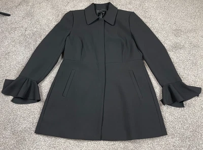 Abrigo básico Zara para mujer grande negro a presión campana aleteo chaqueta academia oscura Foto 1 de 4