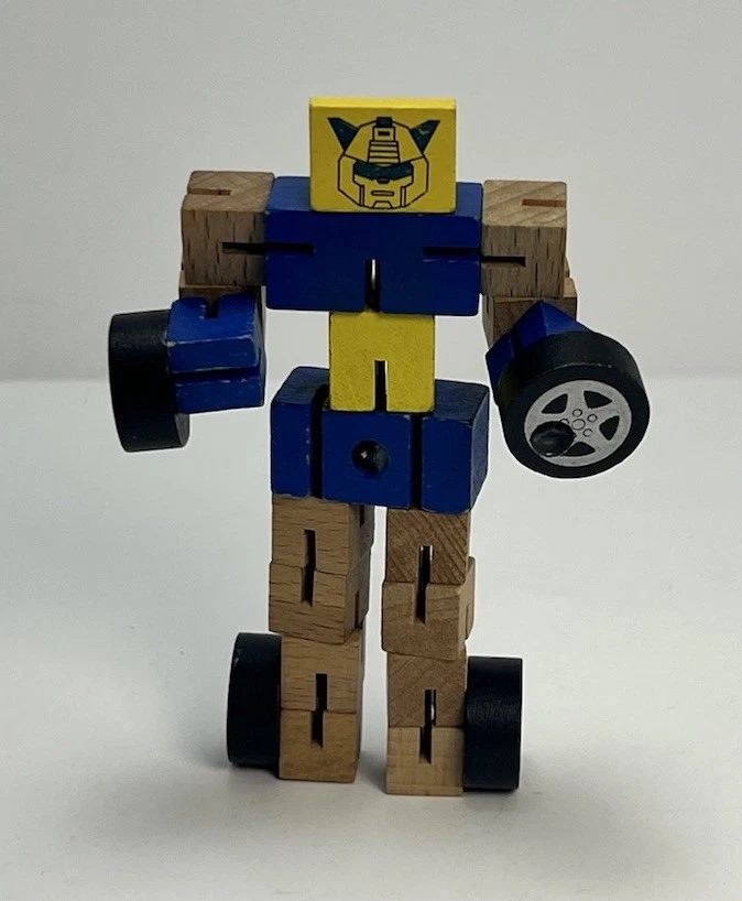Figura de acción cambiable de madera Transformer Toy Robot Foto 1 de 4
