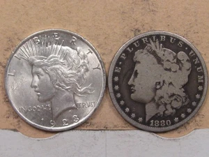 2 dólares de plata de Estados Unidos Morgan de los años 1880 y Paz de 1923. #15 - Imagen 1 de 6
