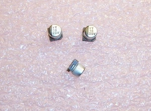 QTY (50) 10uf 25V SMD ALUMINUM ELECTROLYTIC CAPACITORS UWX1E100MCR1GB NICHICON - Picture 1 of 2