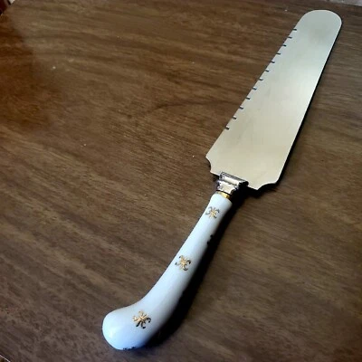 Cuchillo para servir pasteles de boda de cerámica vintage Sheffield Fleur De Lis INGLATERRA Foto 1 de 4