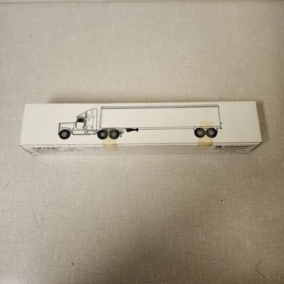 Ertl 1/64 cabina internacional con remolque Oregon Trail hecho en 1991 nuevo... Foto 1 de 4