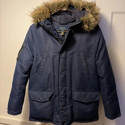 Parka Polo Ralph Lauren para niños talla L 12-14 con capucha de piel azul acolchada aislada Foto 1 de 4