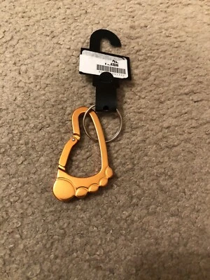 Llavero de pie llavero abrebotellas naranja Foto 1 de 2