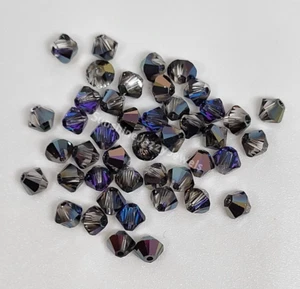 24 Stck. Swarovski Kristall Lila Heliotrop Doppelkegel Perlen; 3 mm oder 4 mm - Bild 1 von 1