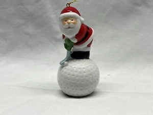 Ornamento de Santa para jugar al golf en una pelota de golf - Imagen 1 de 2