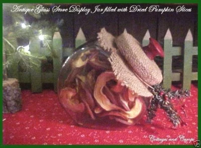 Antiguo tarro de galletas de caramelo de exhibición de vidrio inclinado de colección perilla roja de Navidad Foto 1 de 3