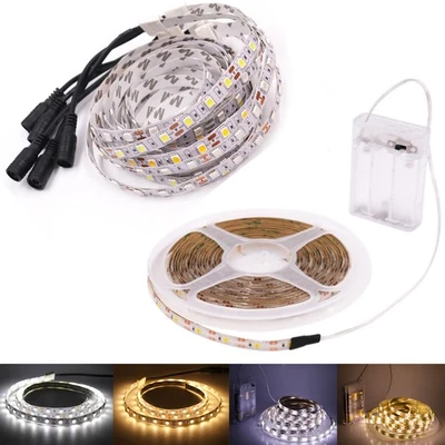 STRISCIA LED SMD 5050 60LED/m 1-5 METRI STRIP BOBINA IP65 CALDA con ALIMENTATO. - Immagine 1 di 4