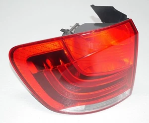 Left Driver Side Outer Taillight Tail Light In Side Panel OEM BMW E84 - Picture 1 of 13
