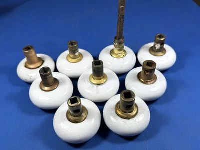 11 C.1910 White Porcelain Door Knobs w/ BRASS SHANKS, No Chips, No Cracks - Image 1 of 4