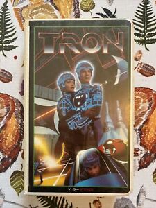 TRON starring Jeff Bridges - Bruce Boxleitner  (VHS, 1982, Clam Shell)
