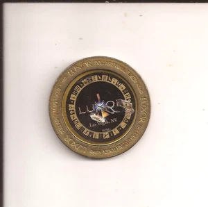 Luxor $1 Casino Token. Las Vegas, NV.  Luxor One Dollar Metal Gaming Token B - Picture 1 of 2