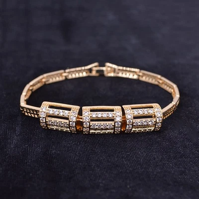 Pulsera de oro amarillo de 18 quilates con dije hueco de topacio transparente de moda para mujer Foto 1 de 2